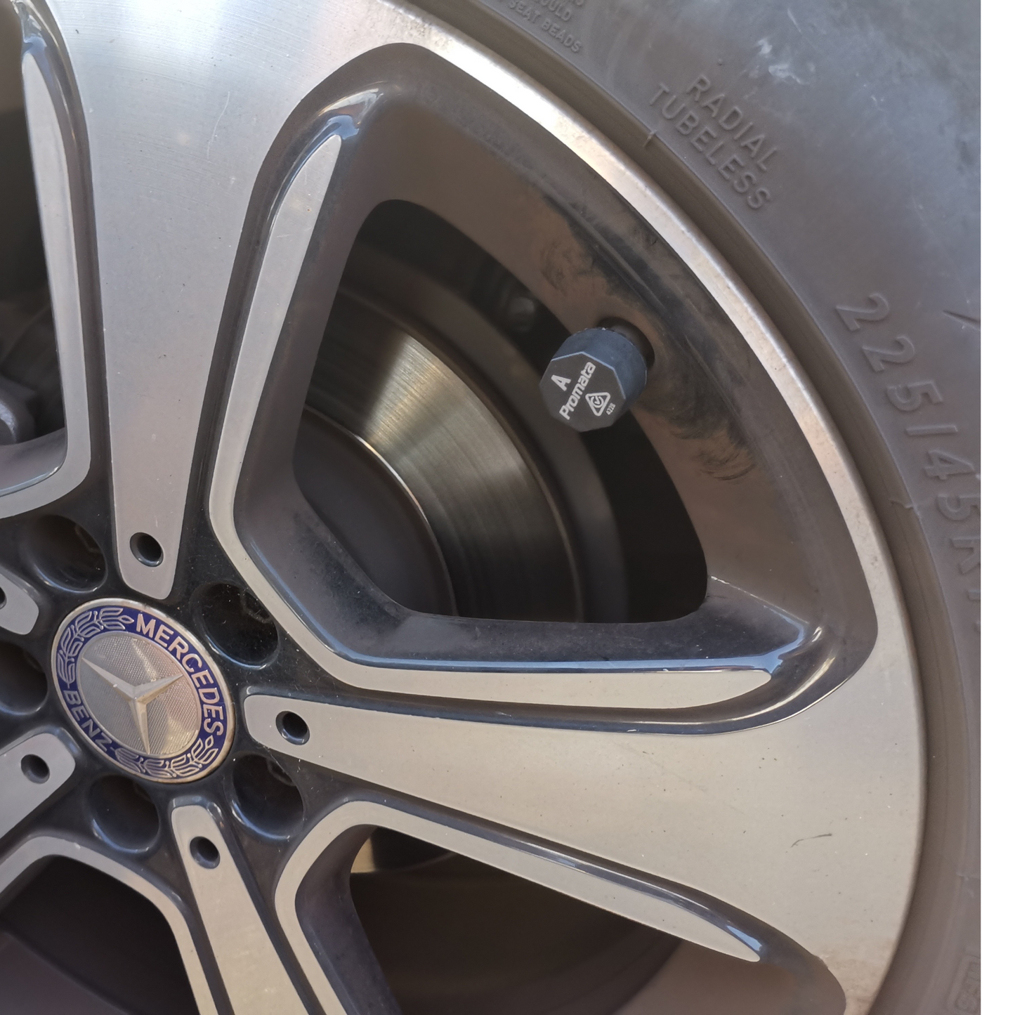 Image of external TPMS sensor on car tyre