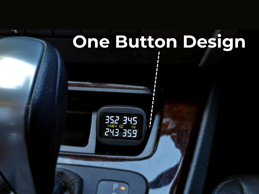 Car dashboard with TPMS monitor showing temperature and tyre pressure - labeled 'One Button Design'