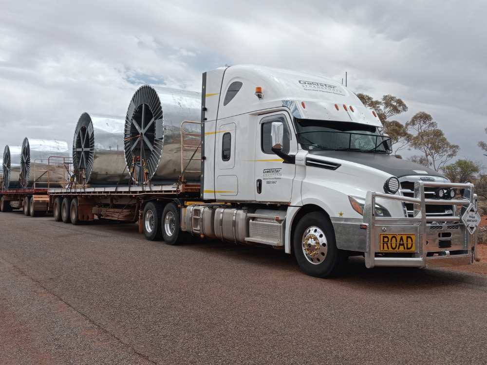 Road train with TPMS kit installed driving down Australian road